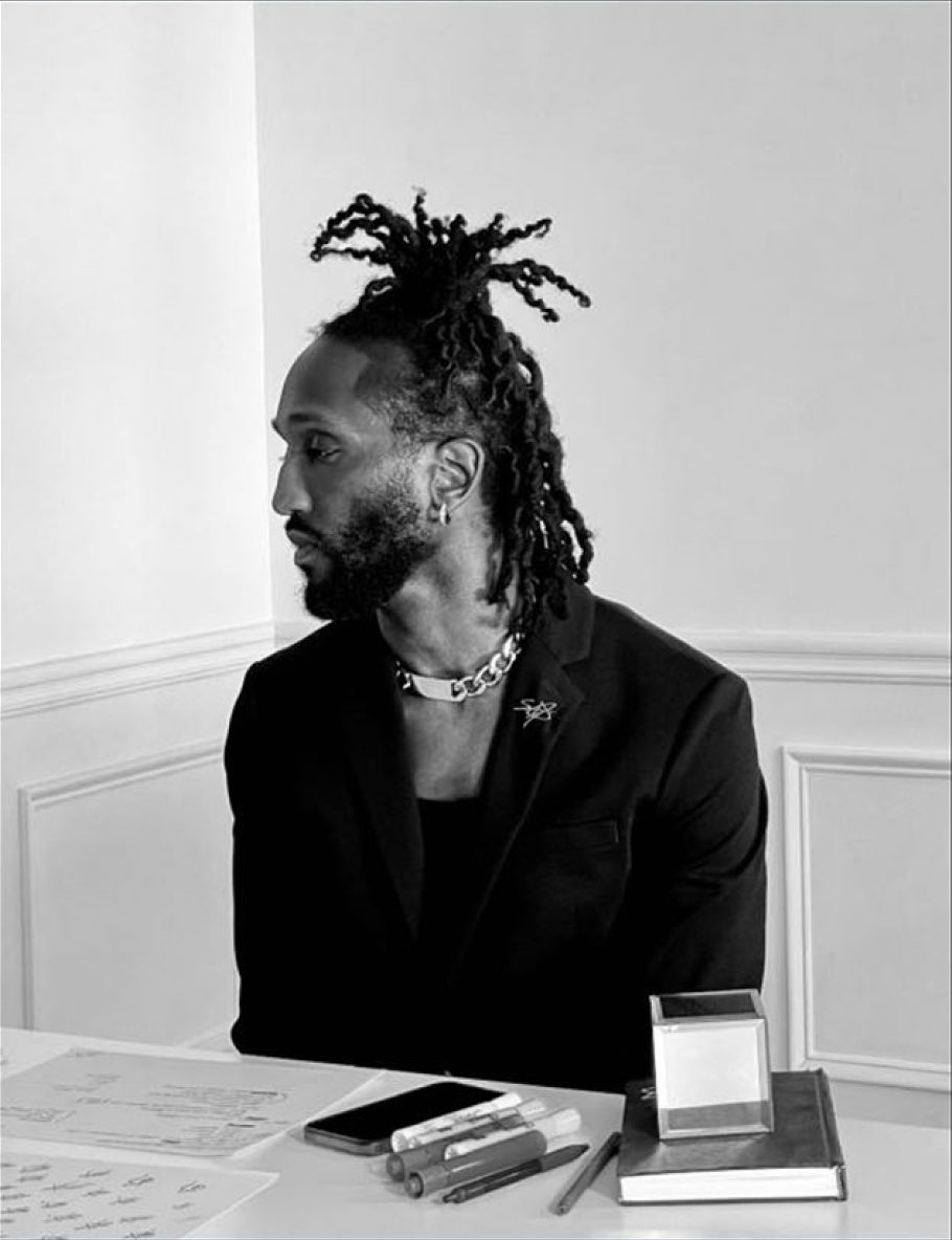 Shrodrick Spikes at his desk